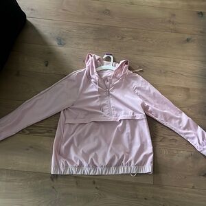 Light pink lululemon zip up hooded packable jacket